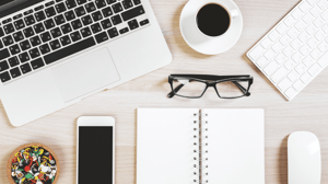 Laptop, phone, notebook, glasses, coffee 