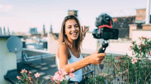 Influencer recording a video with a camera